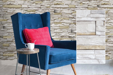 Kinara-las-mejores-piedras-decorativas-pared-distribución-y-venta-ecuador-ALPES-NIEVE Sillón azul con pared de piedra decorativa y fachaleta blanca