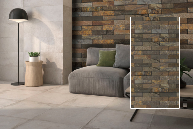 Kinara-importación-y-venta-piedra-natural-7.5x30cm-interior-exterior-AQUA-GOLD sala pequeña con pisos y paredes revestidas con cerámica tipo piedra natural en colores tierra piso beige porcelanato antideslizante lámpara negra