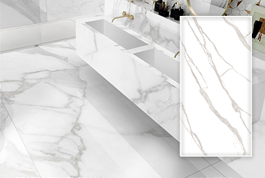 porcelanato_espanol-STATUARIO VENETIAN porcelanato en pisos de color blanco con vetas negras y mesones de porcelanato, grifería dorada empotrada