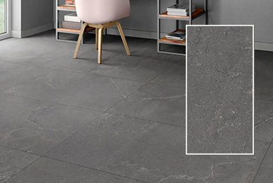 porcelanato_espanol-TROPIC NERO Porcelanato español gris mate en pisos rectificado, con silla blanca