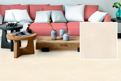 porcelanato_tipo_cemento-ICONIC-CREAM Porcelanato 60x60 cm en hogar con aciento rosa y cojines blancos
