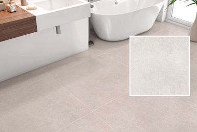 porcelanato_tipo_cemento-LIMESTONE-WHITE Piso de ceramica antideslizante en baño formato 60x60 cm color gris con bañera blanca y meson de baño de porcelanato