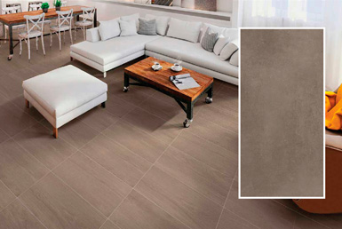 porcelanato_tipo_cemento-ZEUS-TABACO Porcelanato en sala color cafe con sillones blancos y pieza de 30x60 al frente
