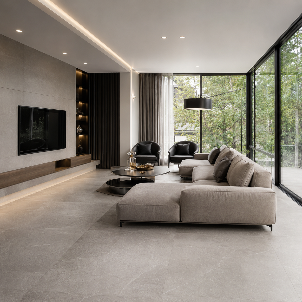 Amplitud visual con porcelanato de gran formato Sala contemporánea con porcelanato de gran formato que genera continuidad visual y sensación de amplitud elegante.